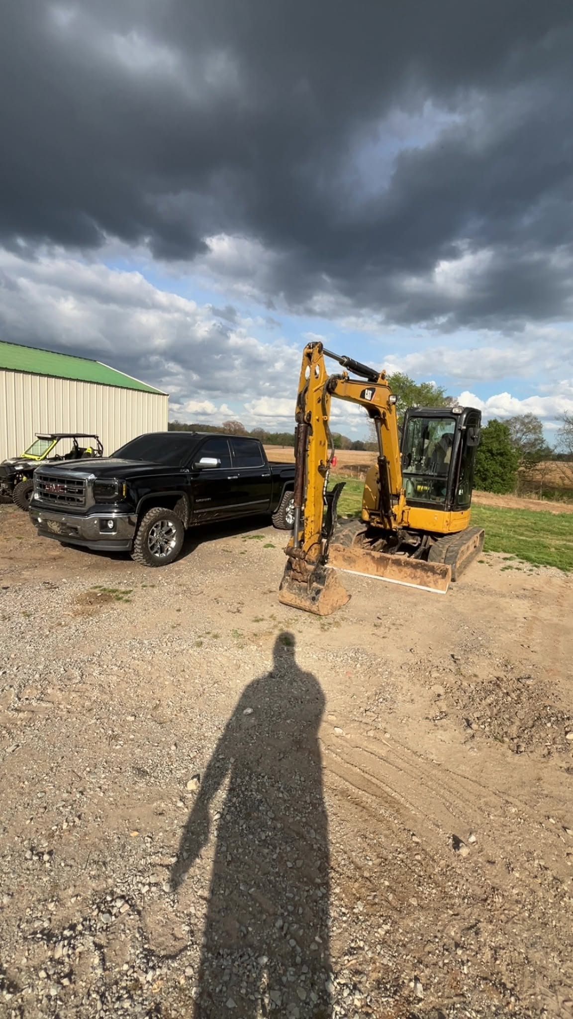 Morris Land Management excavator and work truck ready for a job